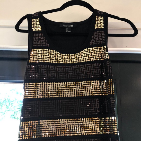 Gold and black striped dress. Only worn once. - Picture 2 of 3